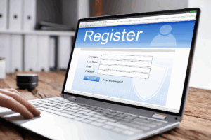 Registration form displayed on an outdated website or brand interface, viewed on a laptop