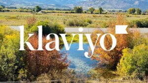 Klaviyo for Shopify logo displayed over a scenic landscape representing connection, growth, and data-driven marketing success.