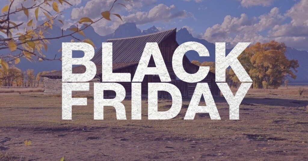 A rustic Wyoming barn with the words “Black Friday” overlaid, representing small business holiday marketing in rural communities.