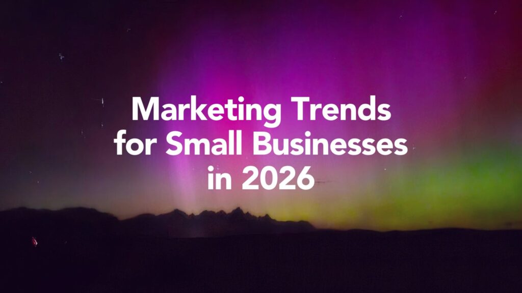Marketing trends for small businesses in 2026 displayed over a colorful sky background with mountains, representing growth, strategy, and future-focused planning.